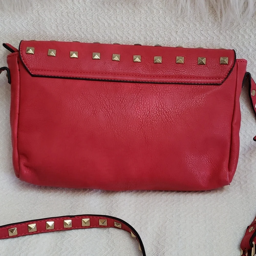 RED studded-embellished lipstick red vegan leather shoulder bag